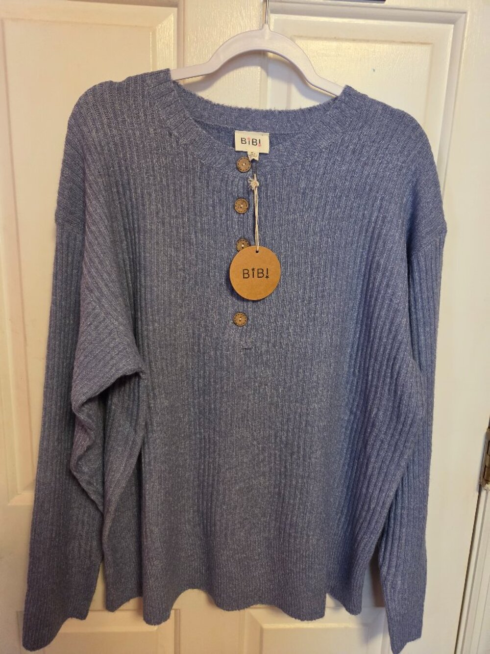 BIbi XL light blue sweater.